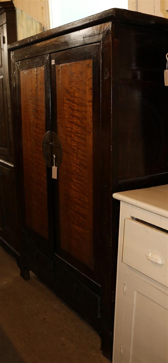 A Chinese hardwood two door cabinet,